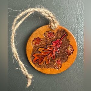 Handmade, hand-carved leaf in leather fall magnet